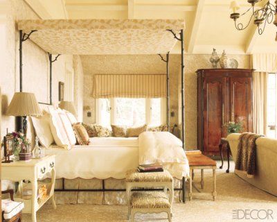 Bedroom with fabric designed canopy via Elle Decor