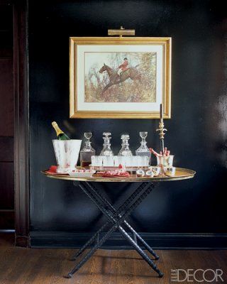 Black high gloss walls and butlers tray in Badgley Mischka's Kentucky Home via Elle Decor