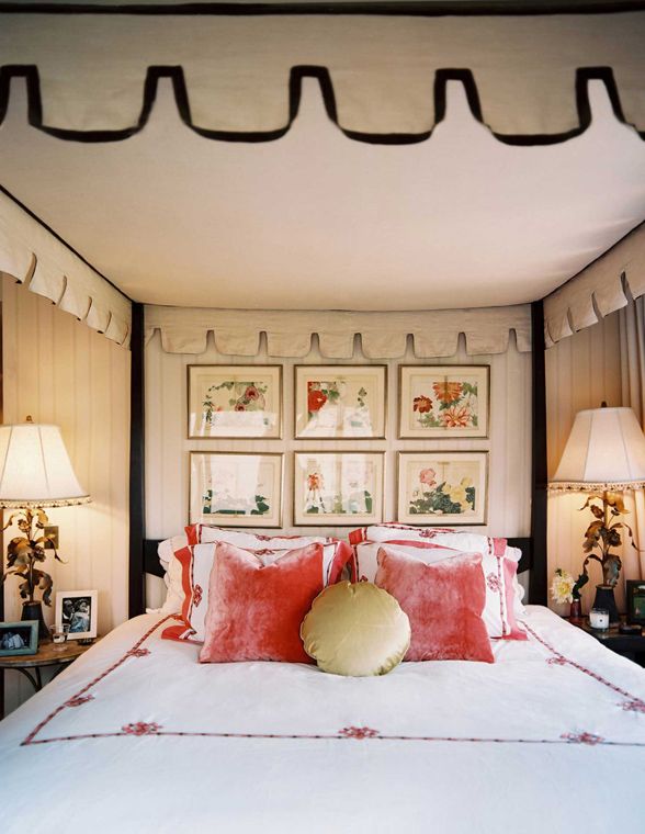 Framed Prints above a bed via savvy home blog