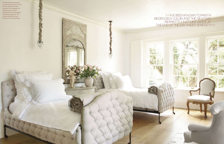 Pamela Pierce designed this elegant guest room with tufted beds via Veranda