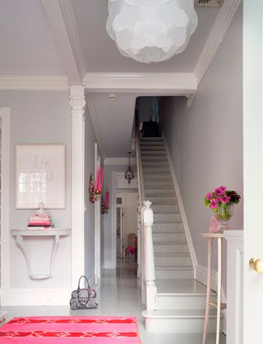 Pops of pink in this narrow hallway by Suellen Gregory via Mix and Chic