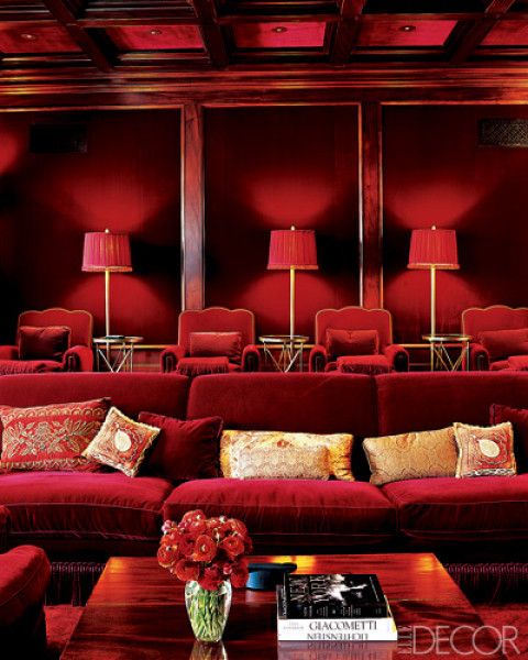 Red velvet movie room via Elle Decor