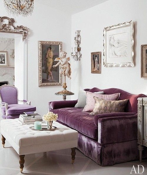 Ottoman with purple velvet sofa via AD