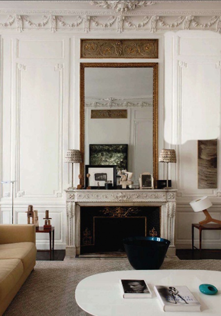 A stunning fireplace in a room designed by Jacques Grange via the White Dresser