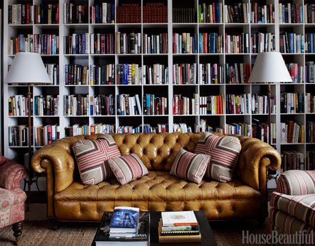 A yummy and comfy tufted library via House Beautiful