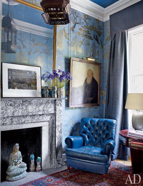 Blue leather tufted chair in the historic Manhattan home of Robert Duffy