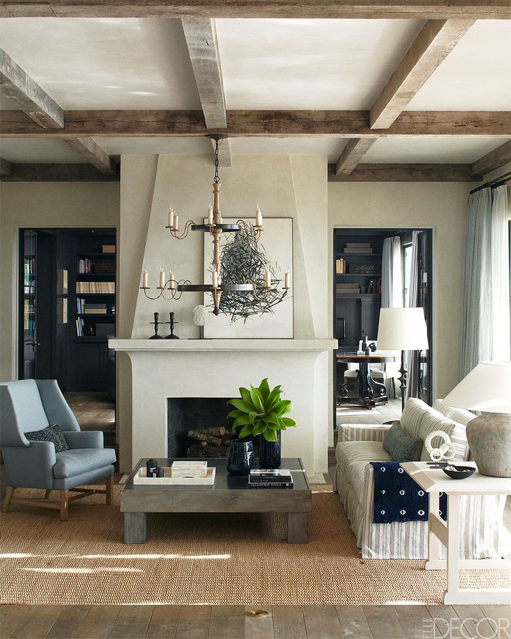 Eclectic and Comfy design around this fireplace via Elle Decor