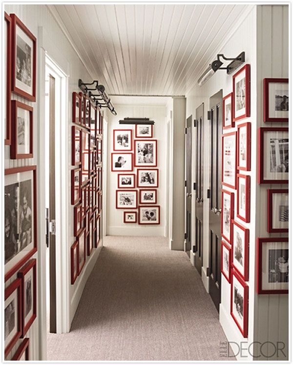 Hallway of Red picture frames via Elle Decor
