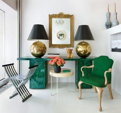 Malachite side table and brass lamps via Elle Decor