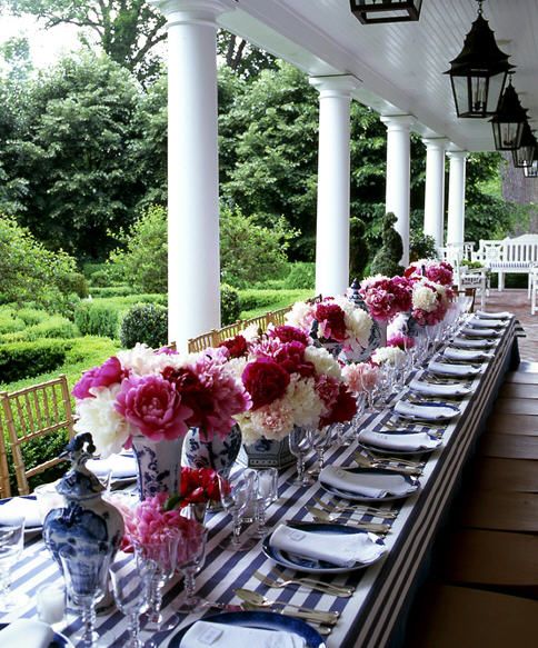 Blue and White vases with pink flowers make for a heavenly tablescape