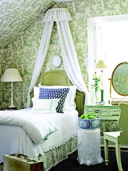 Green and white toile with accents of blue via Traditional Home