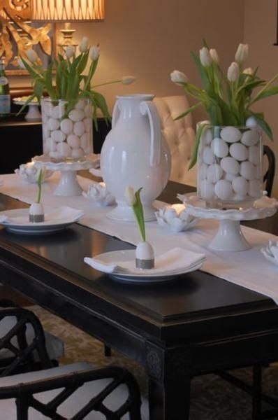 Egg filled glass vases with tulips for a Easter tablescape