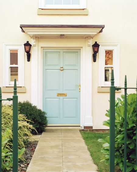 blue front door via house beautiful