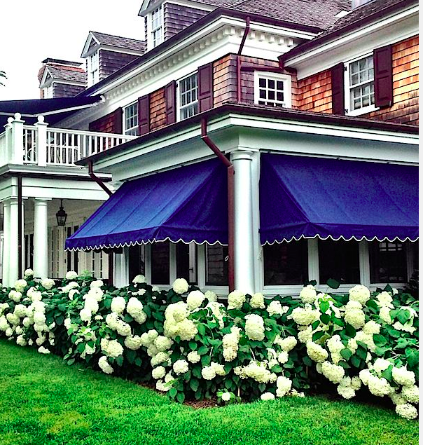 Navy awnings at the home of Alex Papachrisdis