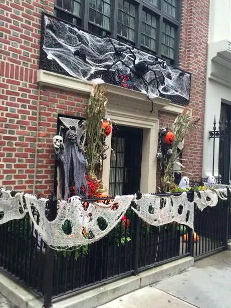 NYC townhouse Haloween decor via The Potted Boxwood