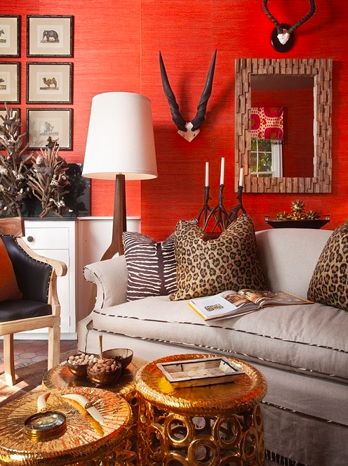 Redish orange wallpaper in a wildly chic setting