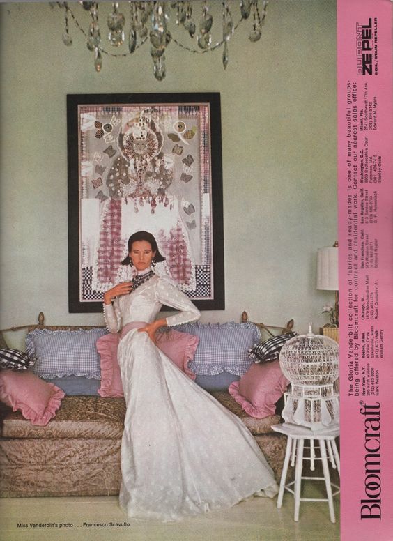 Gloria Vanderbilt posing in her NY apartment for Bloomcraft. AD May/June 1974
