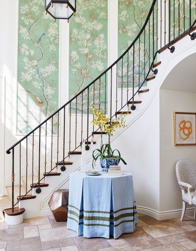 Chinoiserie panels up the staircase by Mark D Sikes