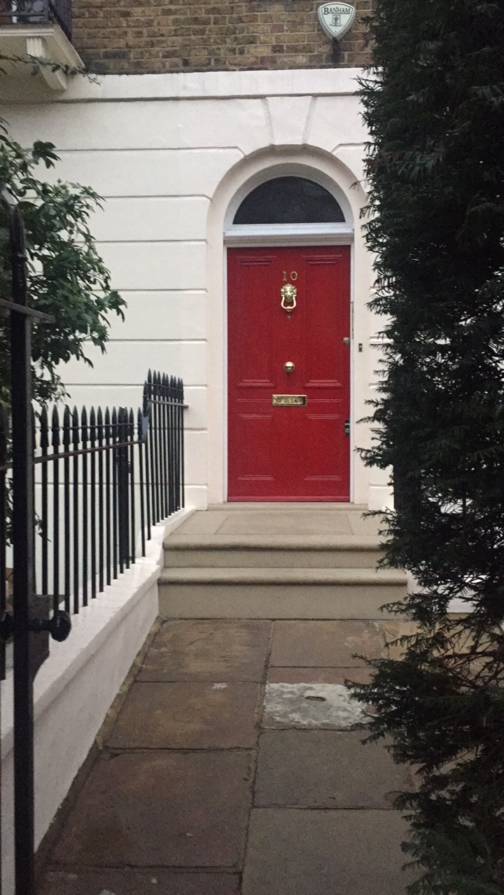 Red door in London photo by Christina Dandar for The Potted Boxwood